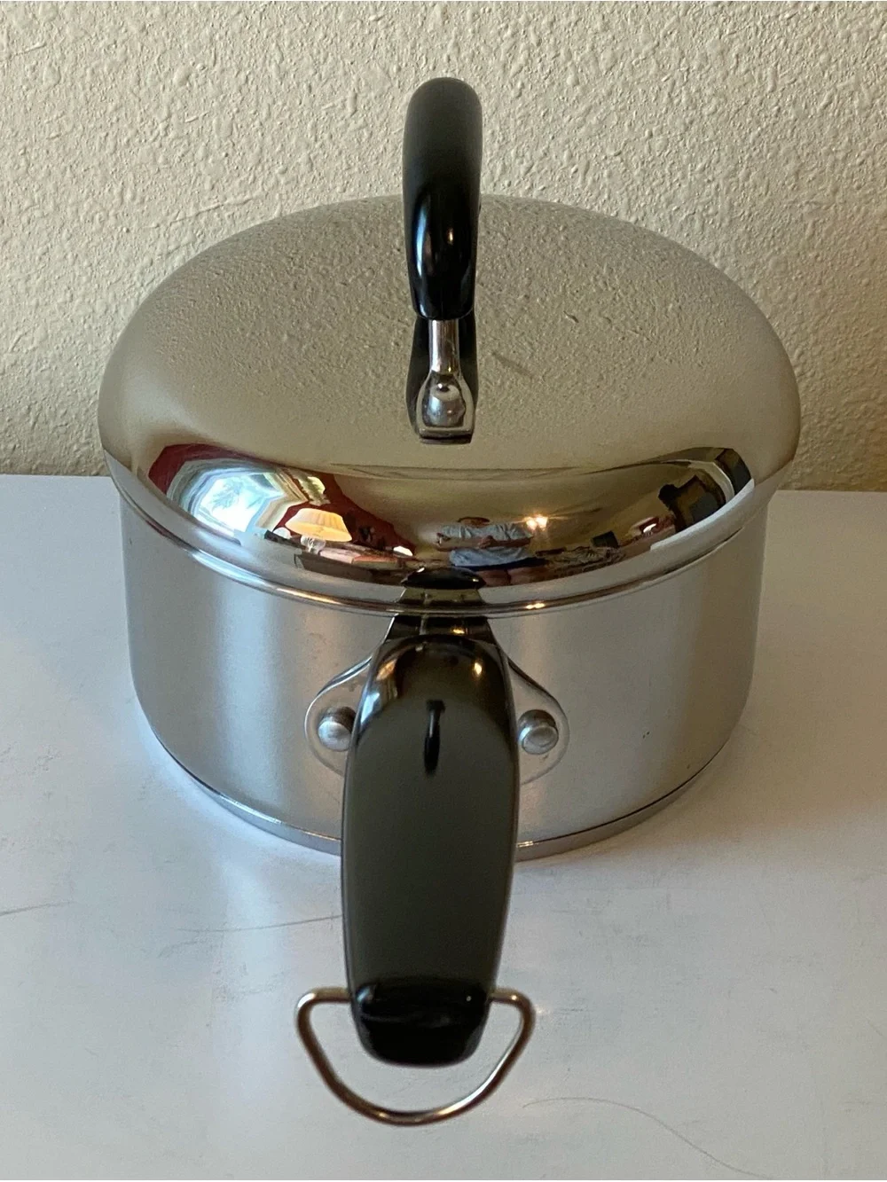 Stainless Steel Saucepan with Black Handle and Lid